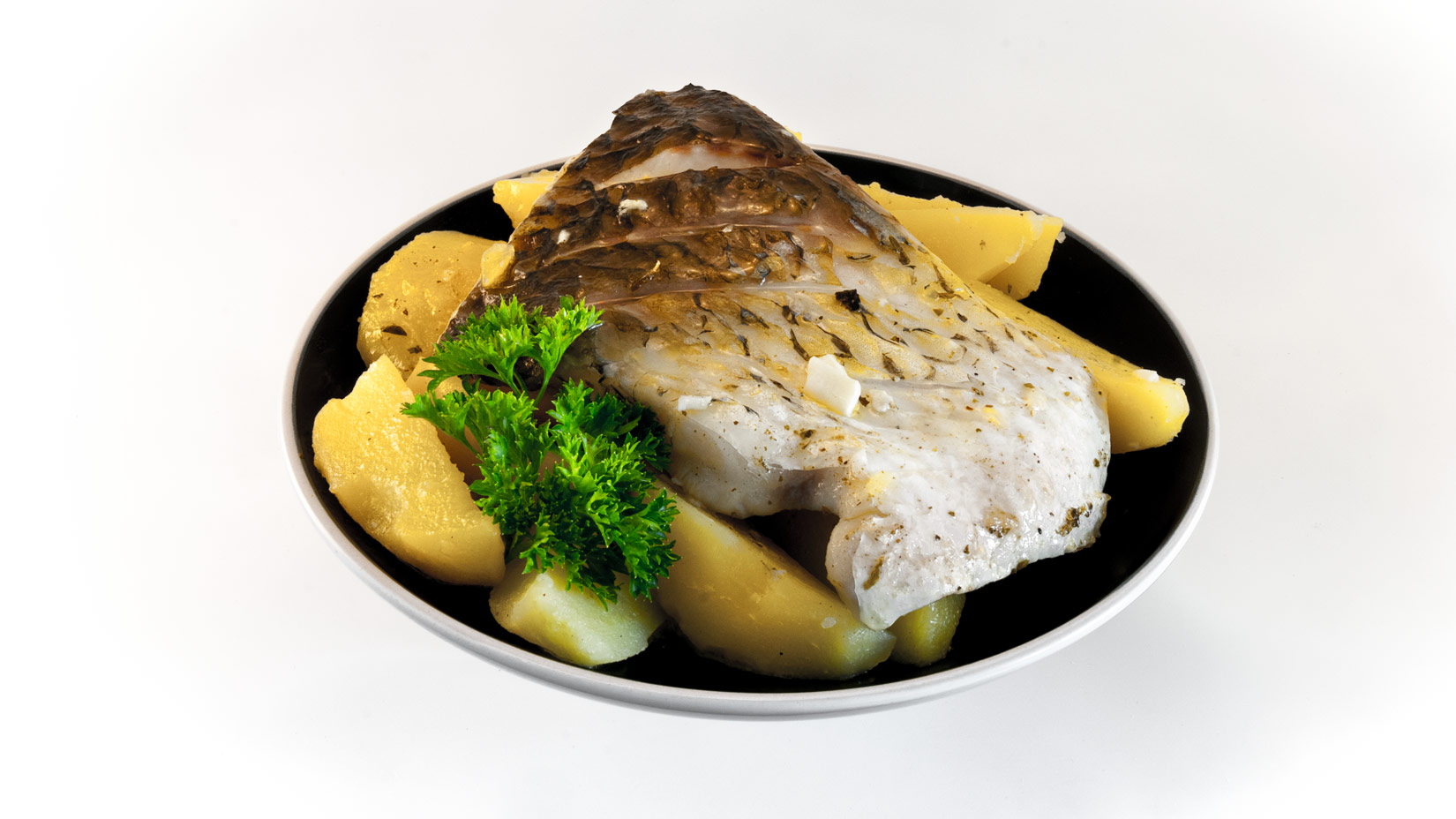 Ryba bianco – dušená ryba s brambory v olivovém oleji
